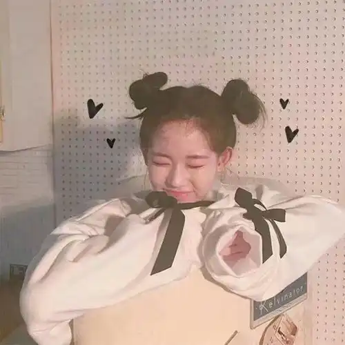 显脸小的丸子头该这么扎