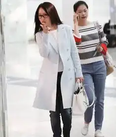 杨钰莹今天带谁去了机场