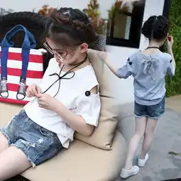 夏季女童蓝色纱质上衣搭配什么下装