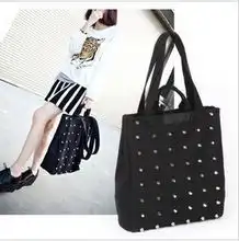 帆布铆钉手提包