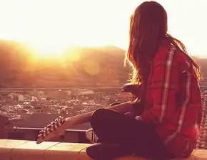 吉他响起我们的情歌却是凄美也不甜蜜