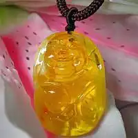 琥珀蜜蜡雕件的寓意男戴观音女戴佛