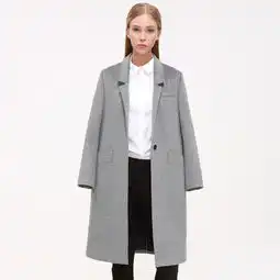 女人穿大衣给人是一种气场上的升华,气场跟随风格,风格改变品味