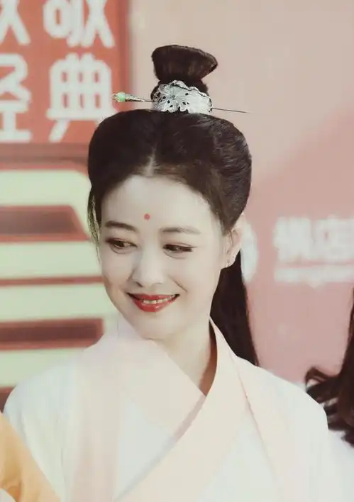 53岁周海媚25年后穿粉衫再扮周芷若仙气飘飘美貌依旧如少女