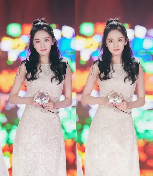 柔美婀娜女星粉色羽毛裙仙气十足