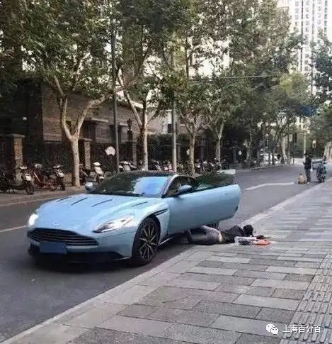 上海一女子开着豪车跟风拍扑街炫富照,因逆行被罚200元扣3分