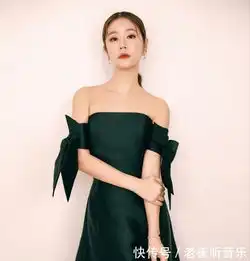 43岁林心如又美了,粉色薄纱配上丸子头,哪儿像辣妈